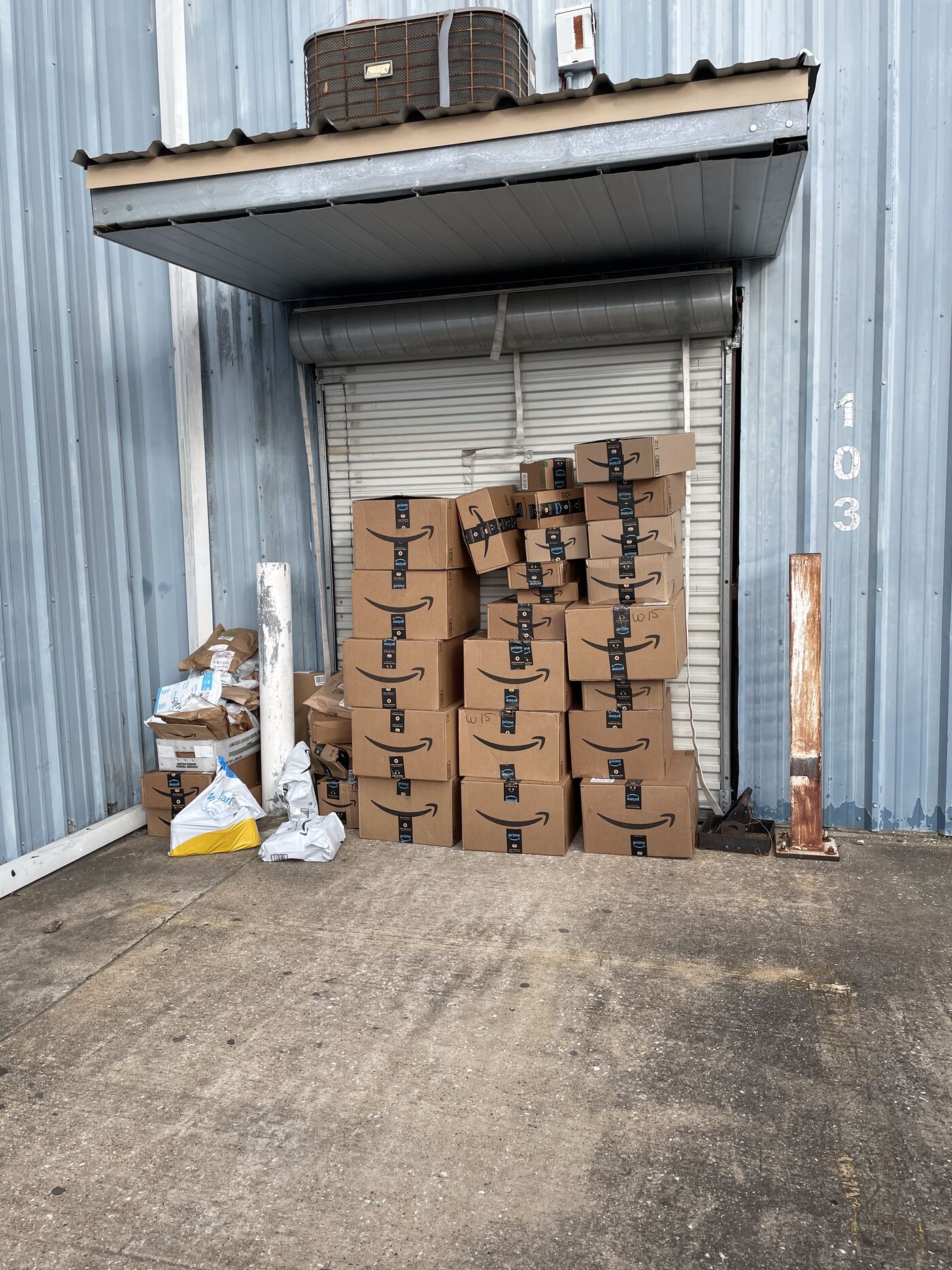 Amazon-branded FBA removal order boxes received and staged at FlexPrep's Houston warehouse